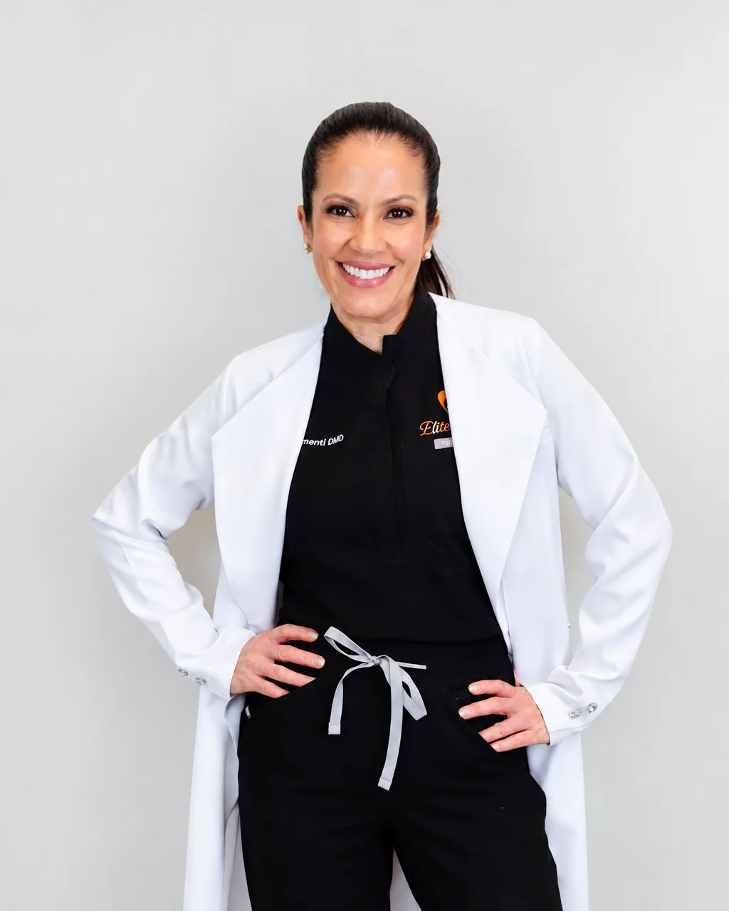 Sylvana Chimenti, DMD, in her white coat