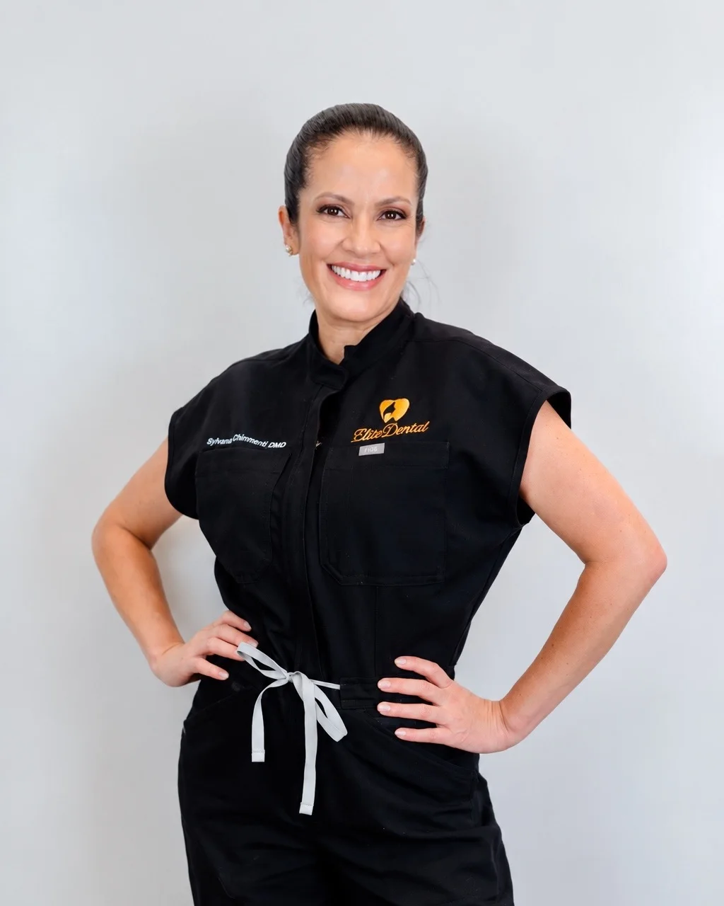 Sylvana Chimenti, DMD, in her Elite Dental scrubs