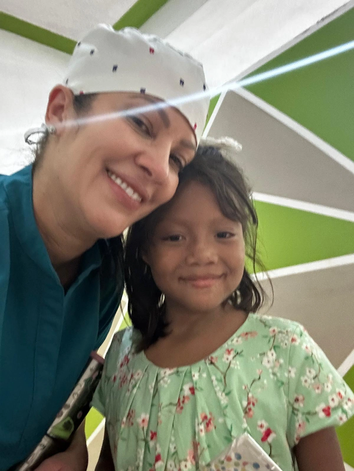 Sylvana Chimenti with a young patient during her mission trip to Honduras